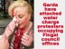 Garda smash glass door in woman's face protesting against water charges at Fingal Co Co