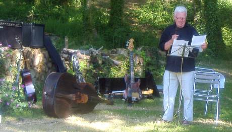 Click on image to see full-sized version Poet Brian Mooney reading at Huelgoat