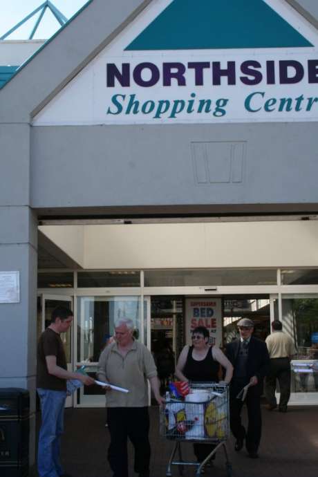 eirigi activist hands out copies of the Proclamation