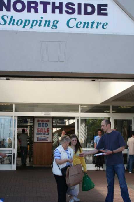 Shopper recieves her copy of the Proclamation