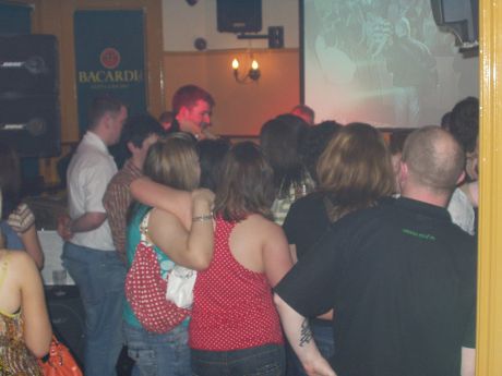 The crowd listen proudly to revolutionary ballads!