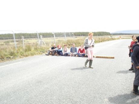 Click on image to see full-sized version Line formed across road
