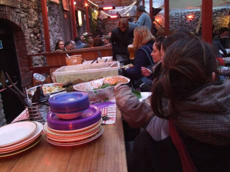 Click on image to see full-sized version Women helping themselves to the Community Meal, Fionbarra's