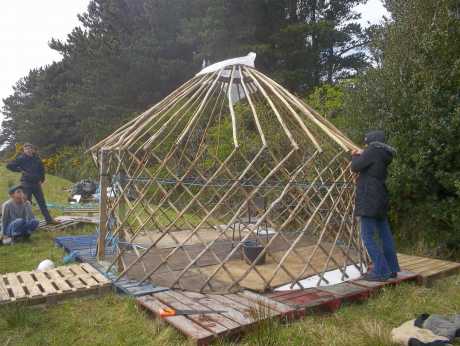 Putting up the yurt in the new field