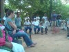 OPIM men at the meeting in their headquarters, Jane Jones from Tlachinollan in the foreground and two Peace Brigades accompaniers who are delegated to OPIM on the far right